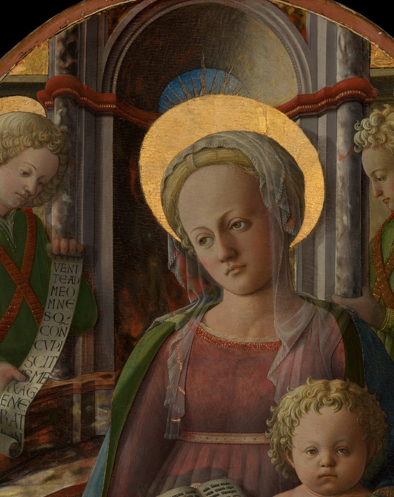 The halo is rendered as a delicate foreshortened disc rather than a flat plate , an Early Renaissance spatial experiment worth highlighting as a technique passage.