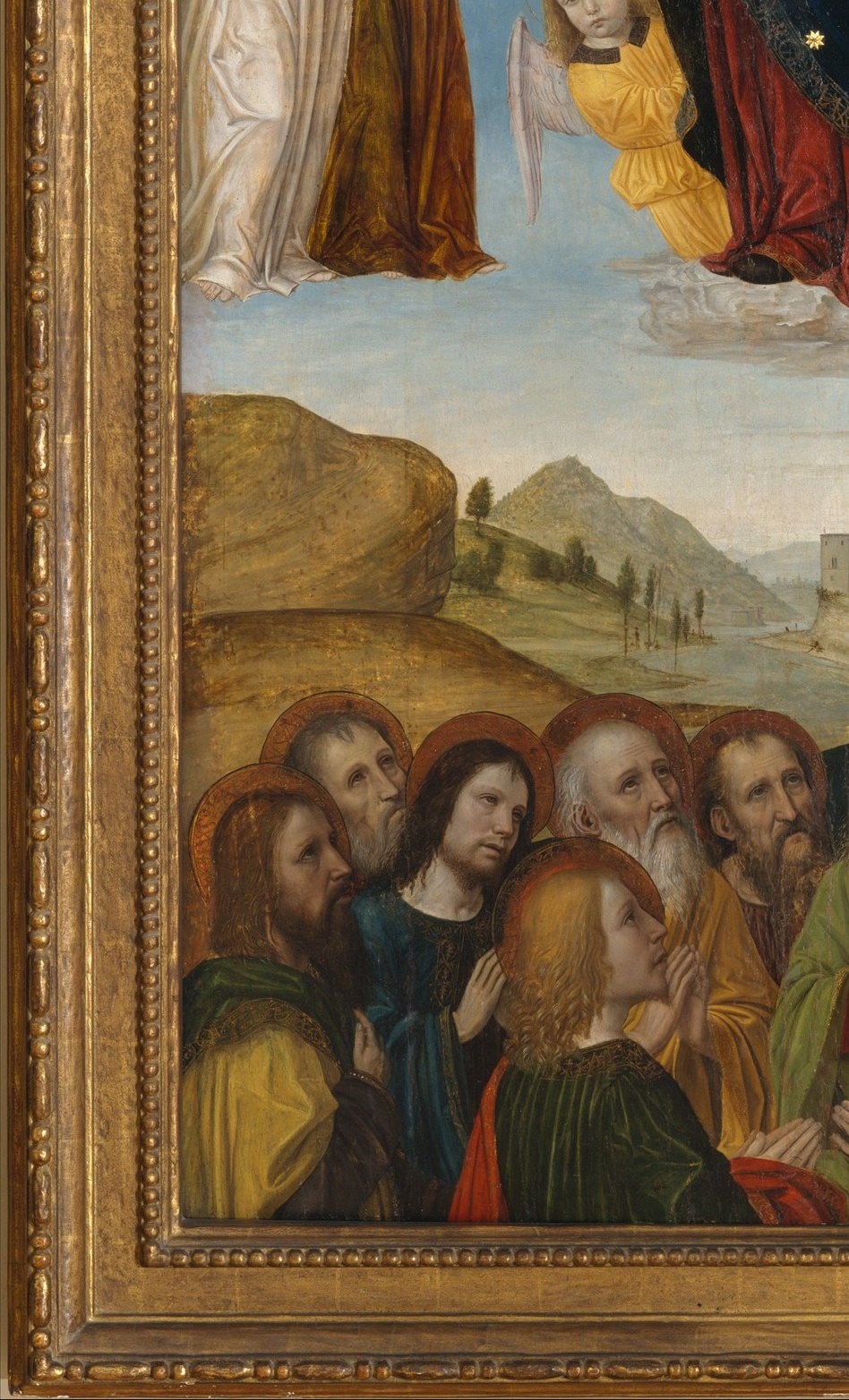 Below, the apostles see what we see: a body becoming light.