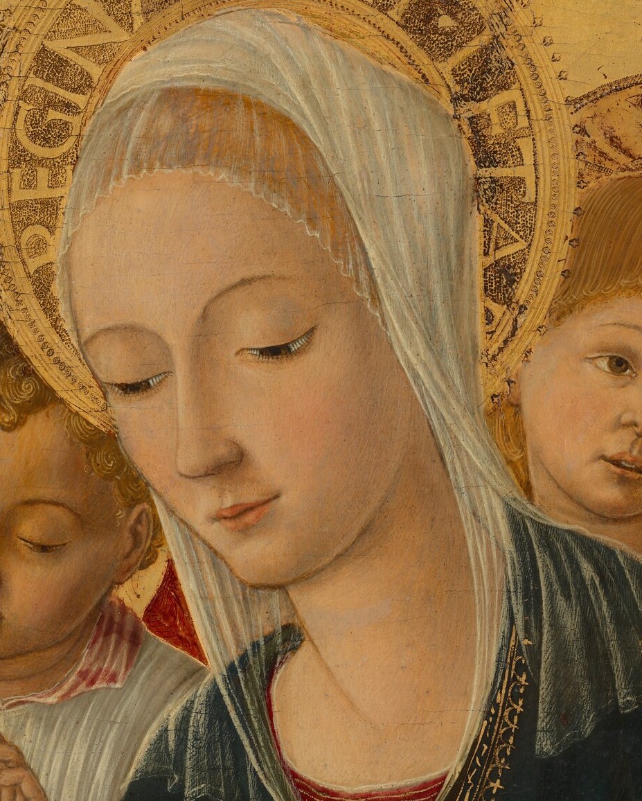 Look closely at the Madonna's halo, at the words.