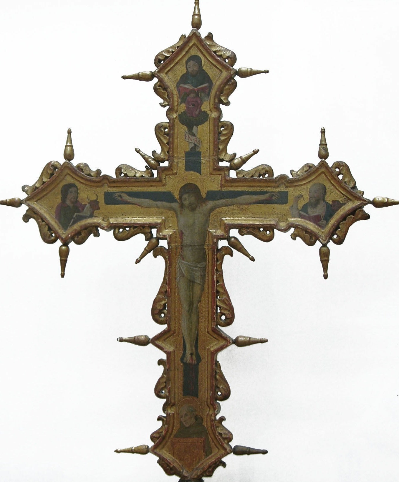 The carved and gilded Gothic framework , trefoil arches, decorative crockets, ogival cusps , is itself a message about the patron's wealth and the workshop's ambition; the junction between painted tempera panel and gilded wood carpentry is a dual-craft technical feat.
