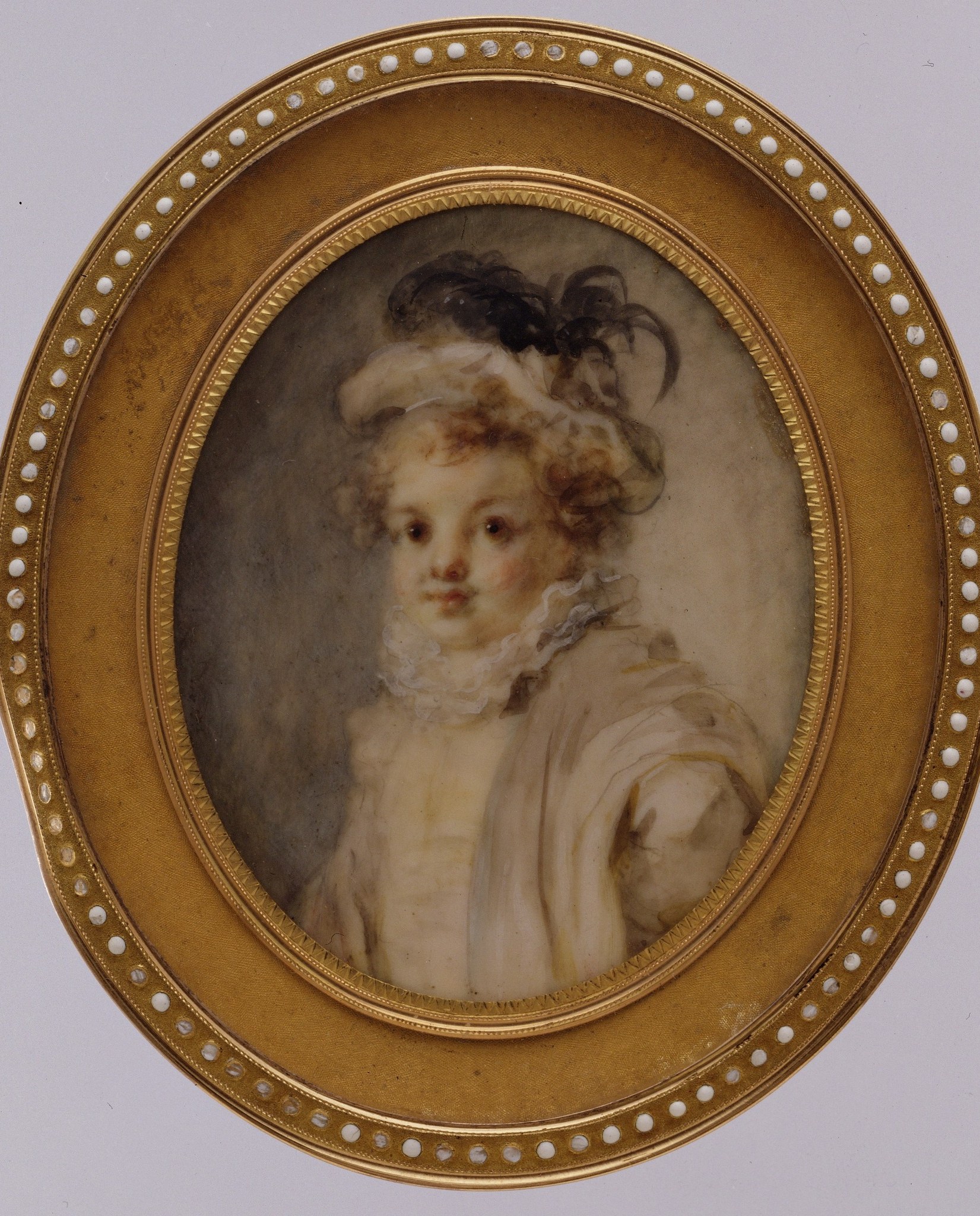 The bead-and-reel molding and warm gold leaf are integral to the period presentation; the oval format was favored for intimate portraits and miniatures in 18th-century France.