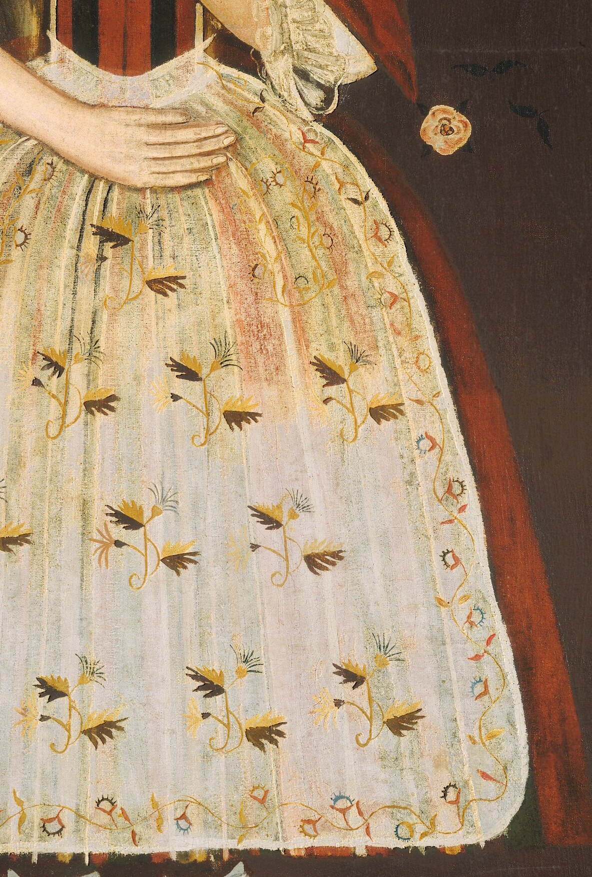 And this white apron is painted with delicate embroidery.