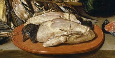 But look closely at the cooked bird on the plate.