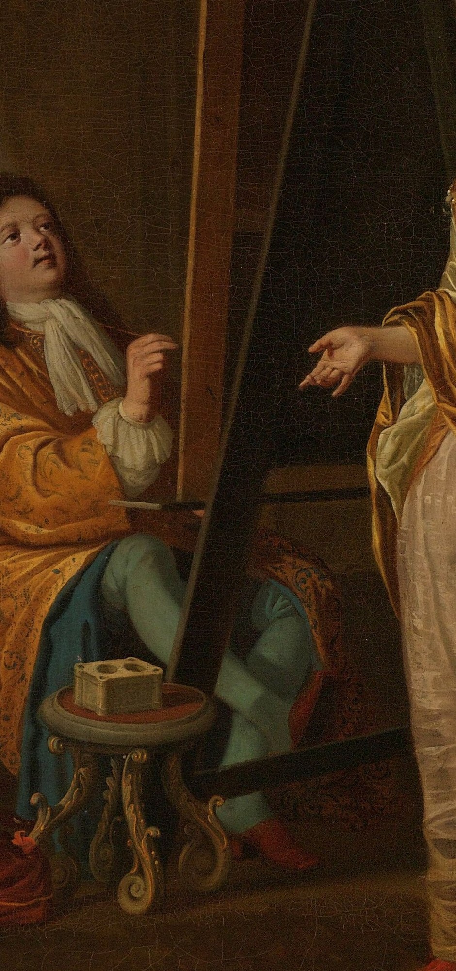 Here he paints a portrait, watched by friends and students.