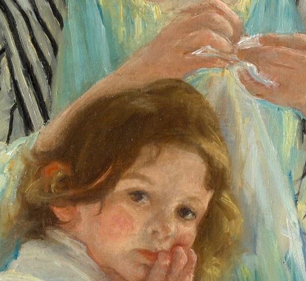 The focal action of the painting; Cassatt's handling of fingers against light fabric shows her Impressionist economy , labor made graceful