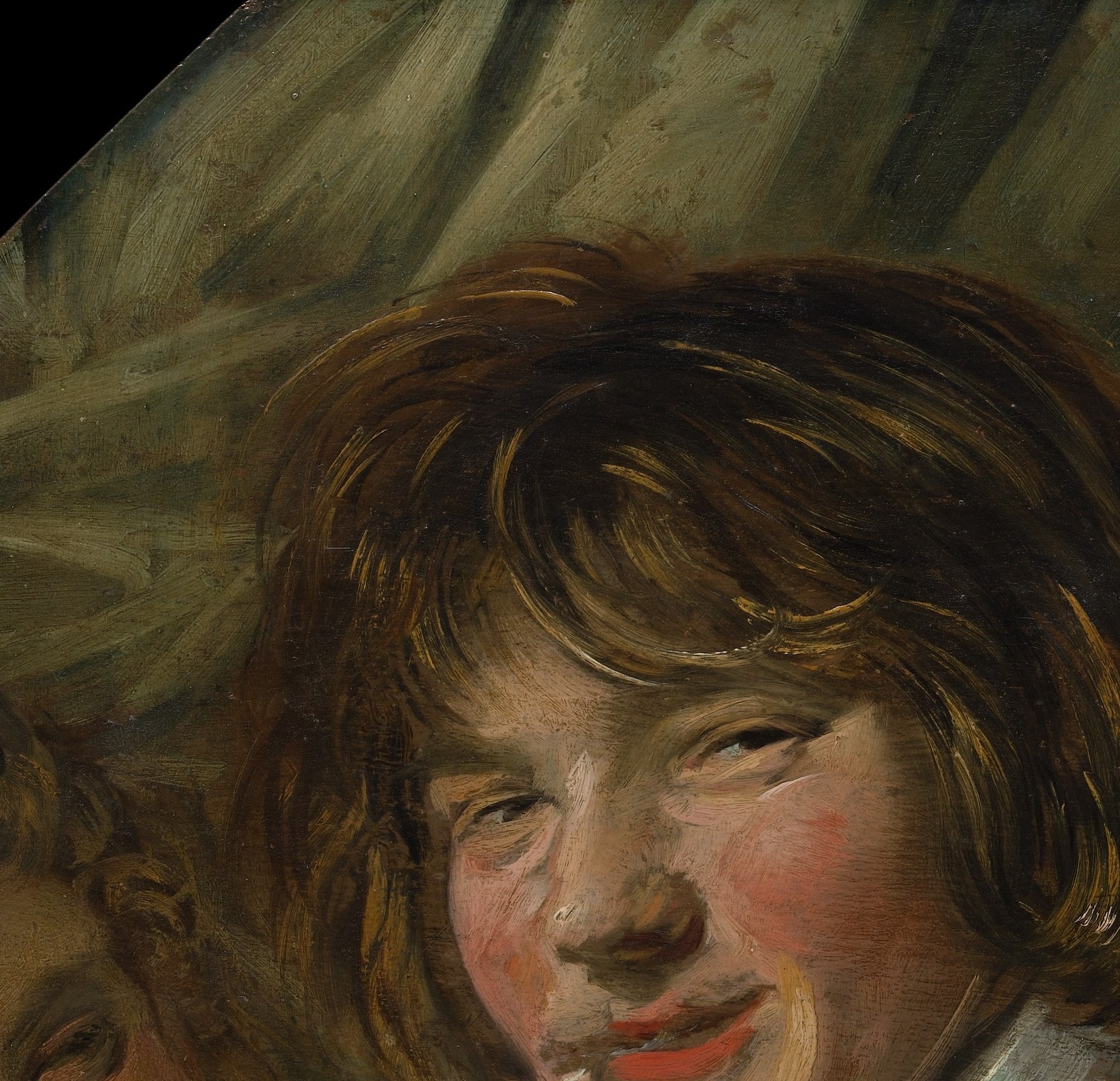 The dominant subject: a young man with an openly laughing, pipe-in-mouth grin that is strikingly informal for 17th-century portraiture , Hals catches a fleeting, candid expression almost no contemporary would dare paint