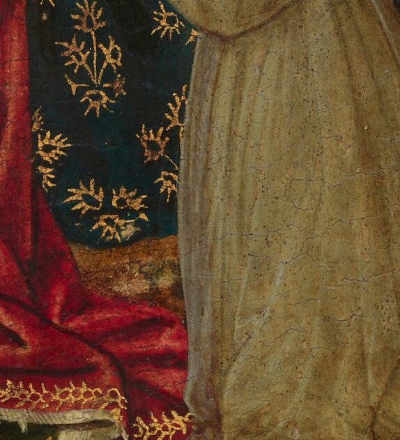 A real person. Kneeling, hands pressed together.