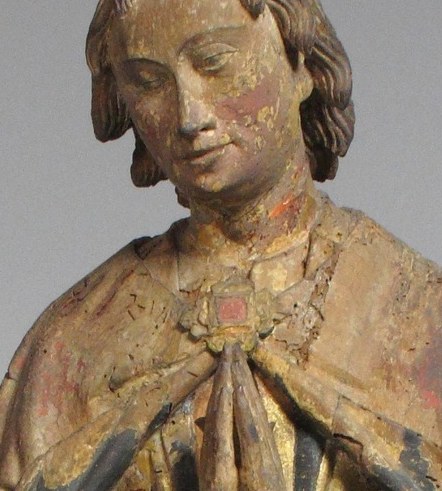 He is Saint Frederick, carved around the year 1450.