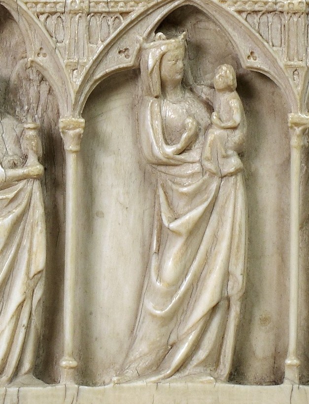 Below: the Virgin holds the Christ Child.