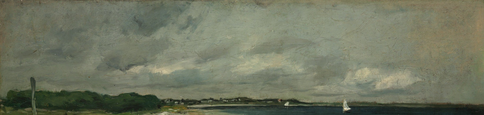 A storm is gathering over the sea.