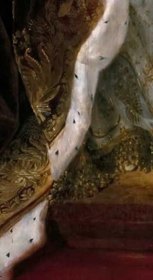 The ermine fur on her throne is a symbol of royalty.
