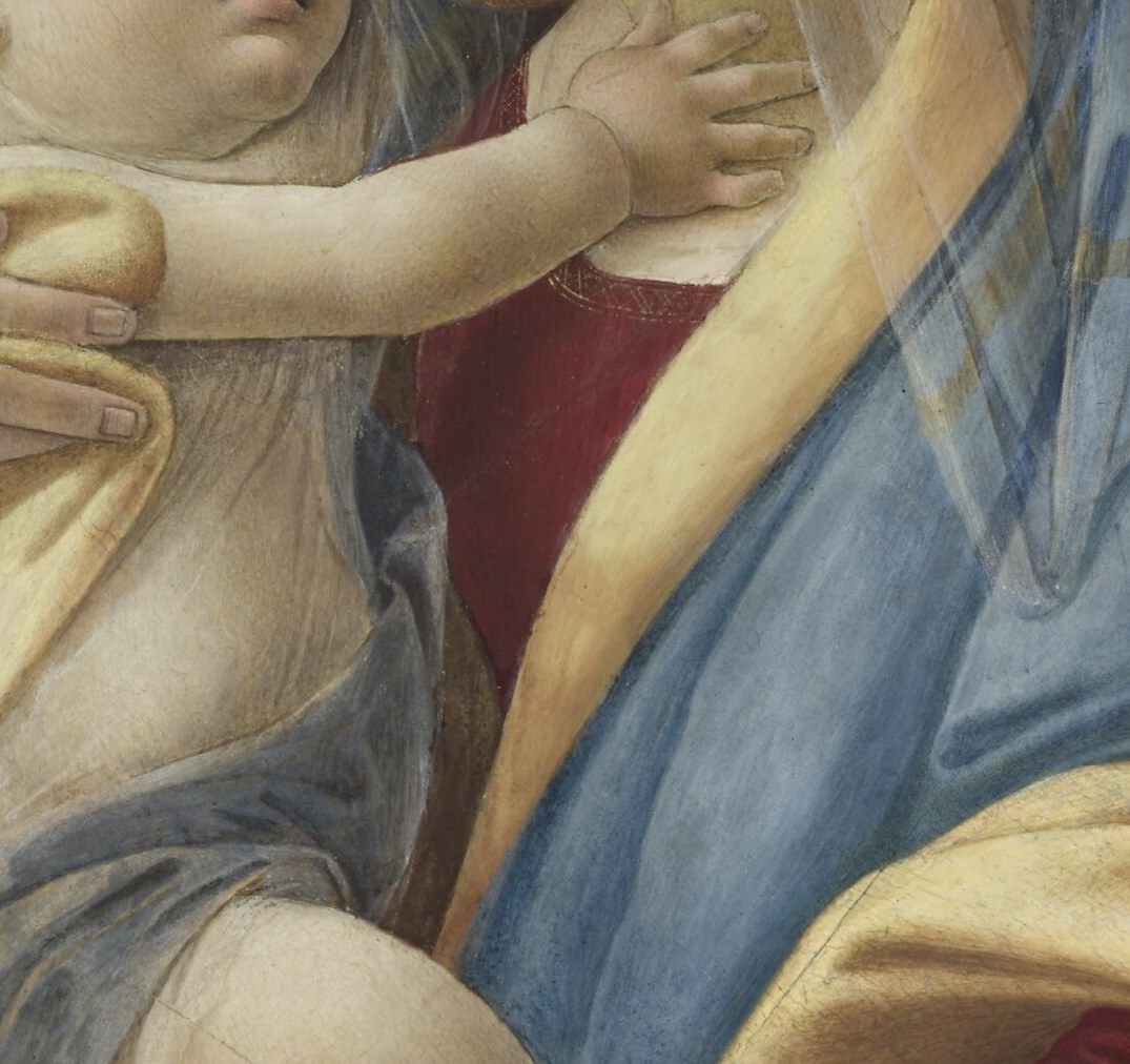 His fingers clutch her veil the way any infant grabs what is close.
