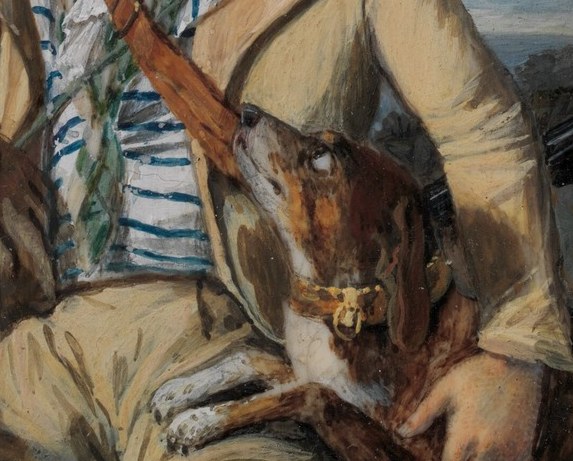 The point of human-animal contact; the gentleness of the touch defines the companionship theme over hunting aggression