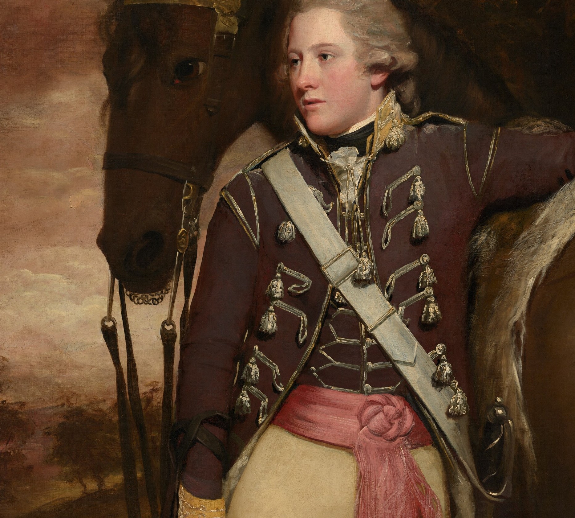 The uniform says soldier. The braid marks his rank.