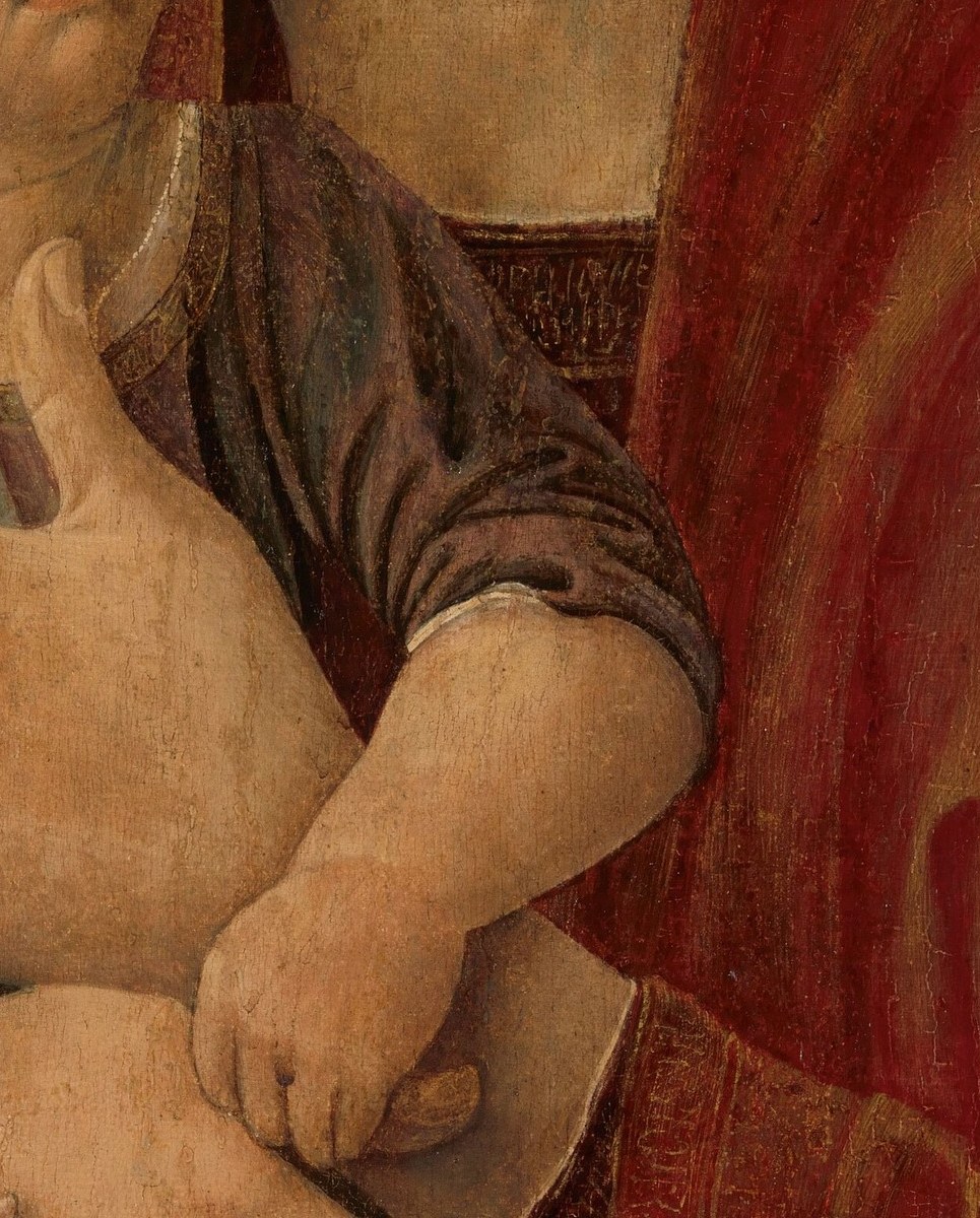 Look at her gentle hands, softly supporting him.
