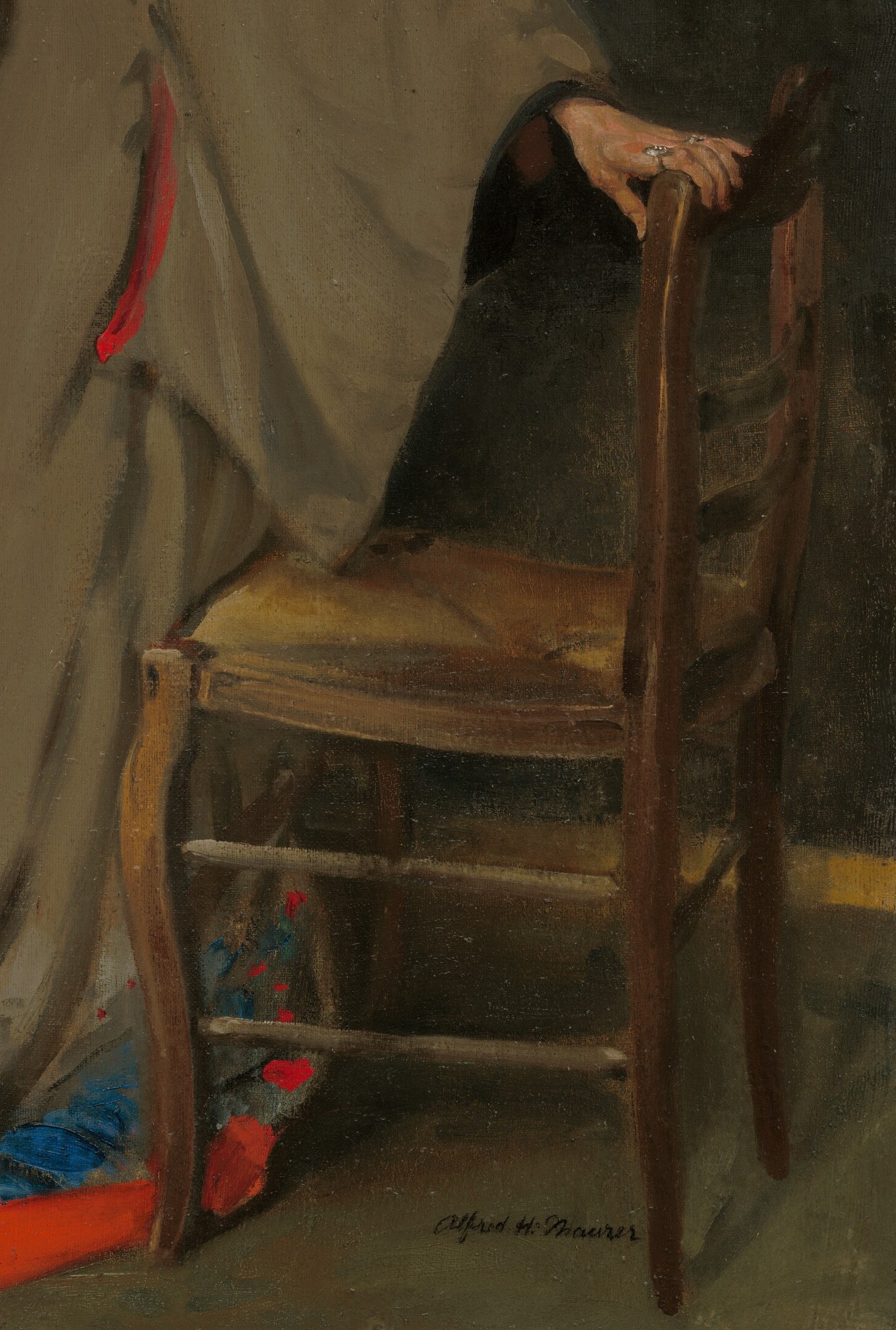 The chair she leans on provides a grounding element and suggests a moment of rest within the domestic setting.