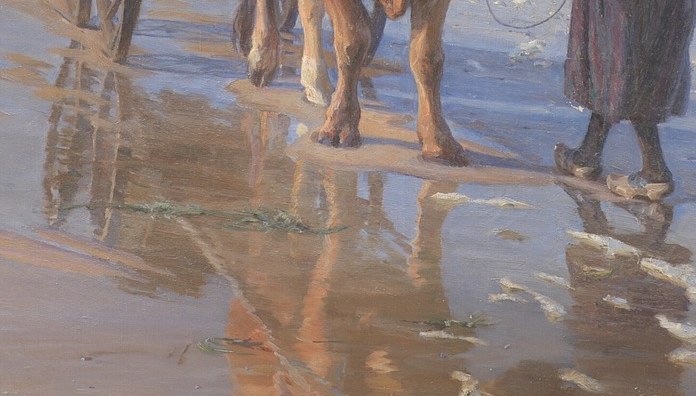 Look at the wet sand reflecting the scene.