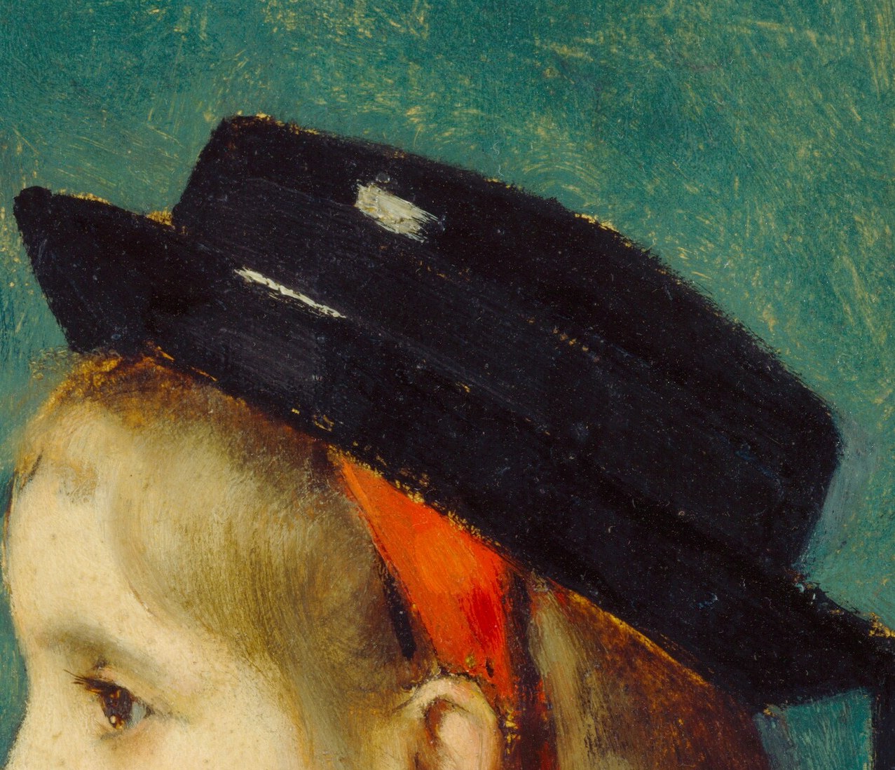 The distinctive hat and vibrant red ribbon are key identifiers of her regional costume and add a focal point.