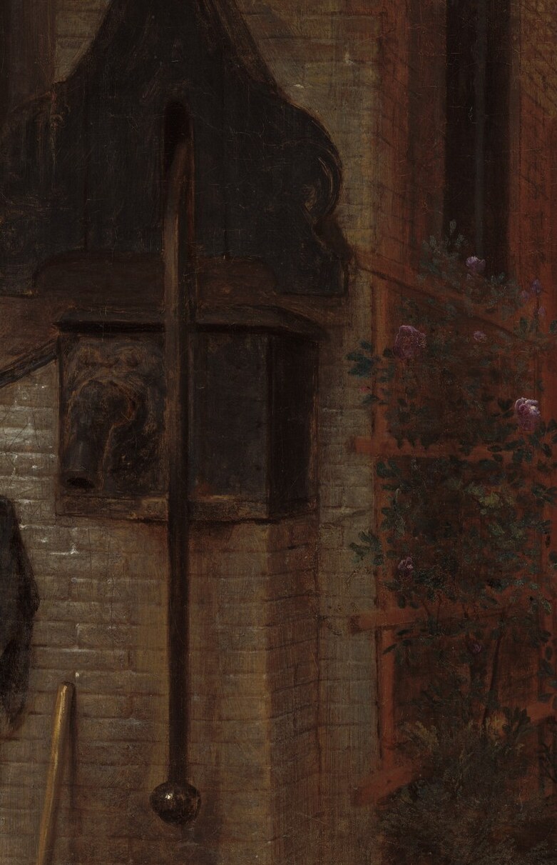 The well in the courtyard promises water and daily chores.