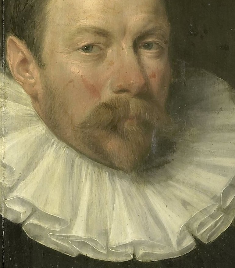 His serious gaze conveys civic authority.