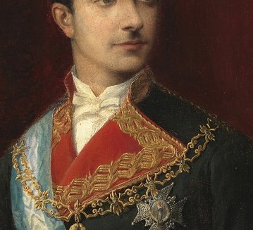 He wears the Golden Fleece, a symbol of high honor.