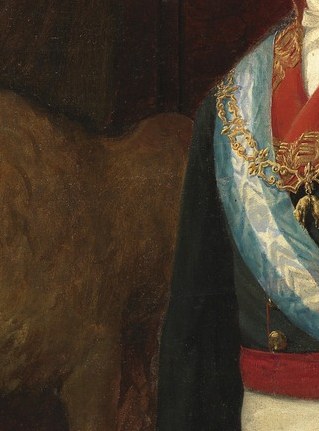 These elements emphasize his royal authority and status.