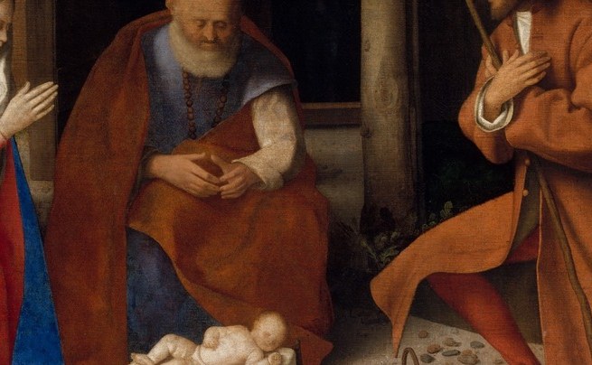 Placed directly on bare ground rather than a proper manger, emphasizing the poverty of the birth; the pale flesh catches the only concentrated light in the composition
