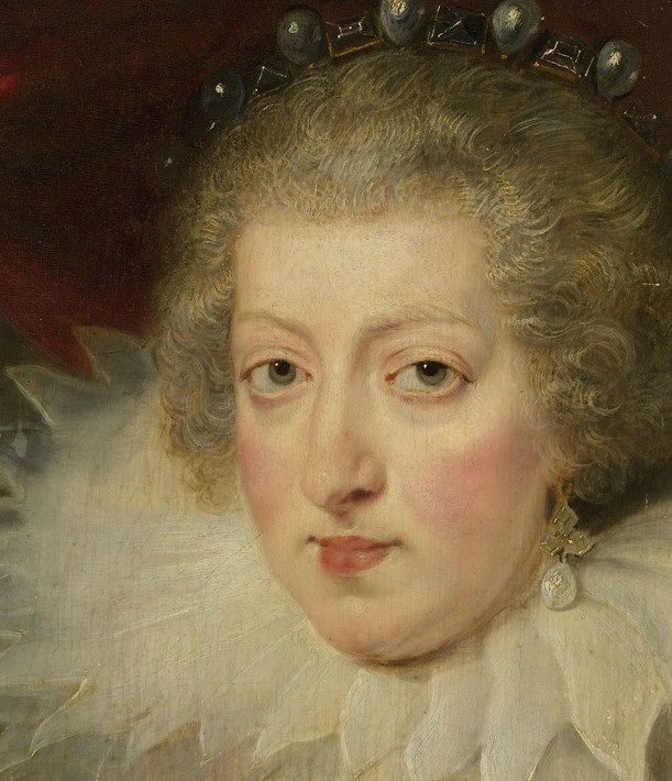 Her direct, composed gaze conveys regal authority and a sense of inner strength.