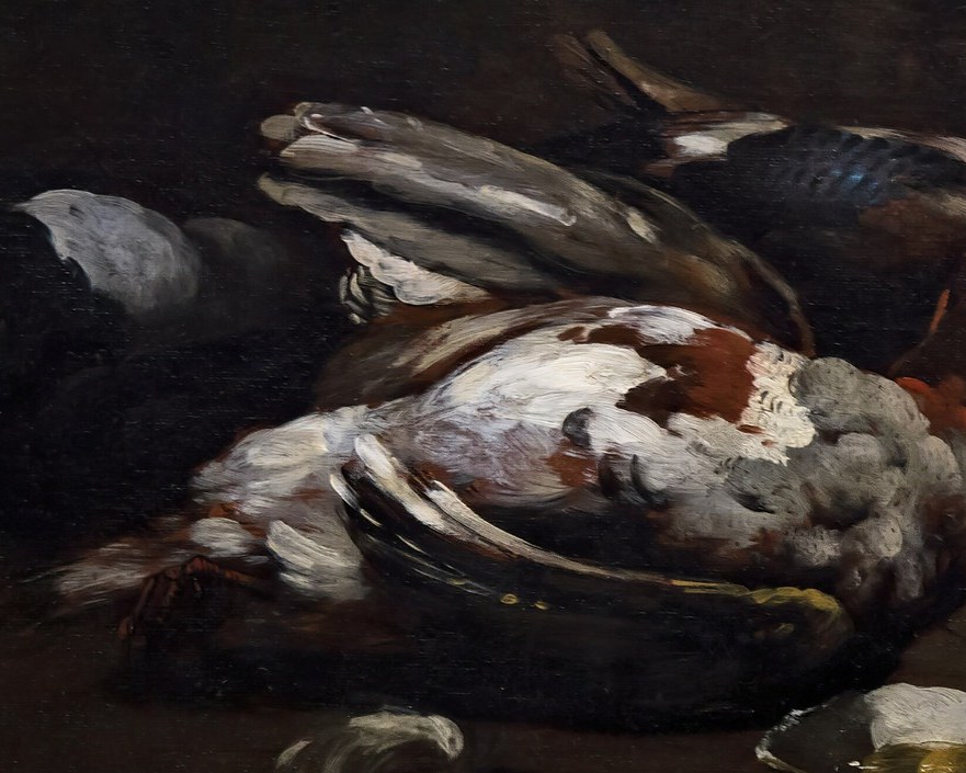 And here, a stark white breast.