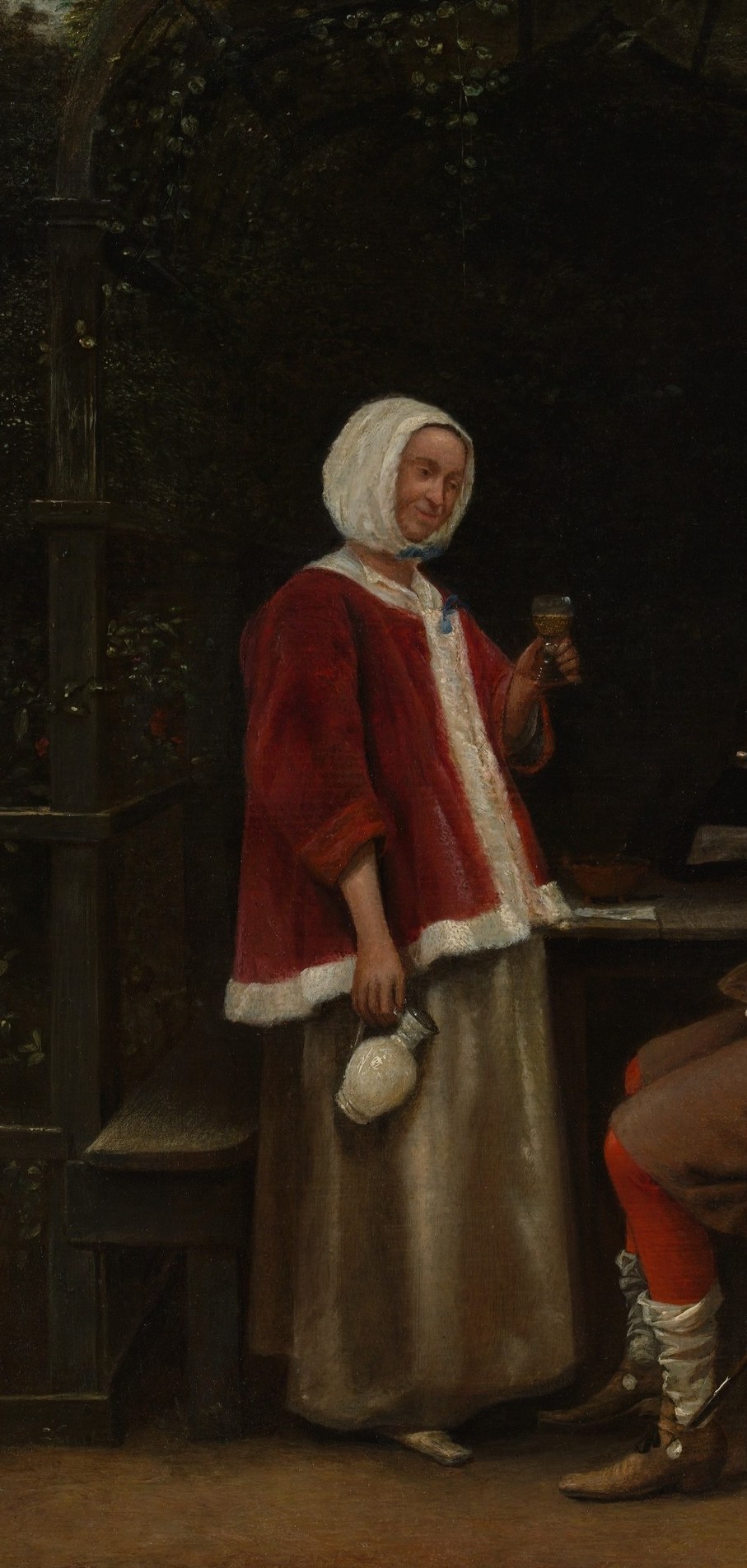 The dominant figure; her upright posture, layered costume, and direct engagement with the seated man anchor the social dynamic of the scene