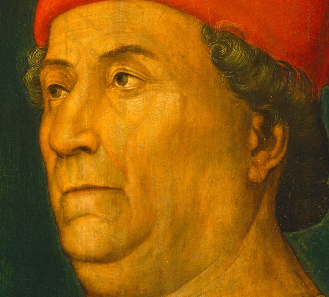 His stern, direct gaze conveys authority and a sense of inner resolve.