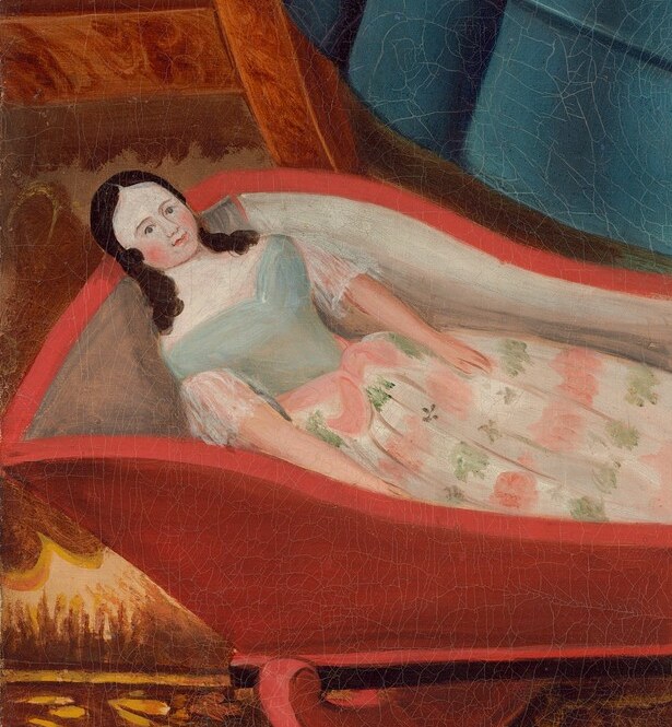 But the small, empty doll's bed tells another story.