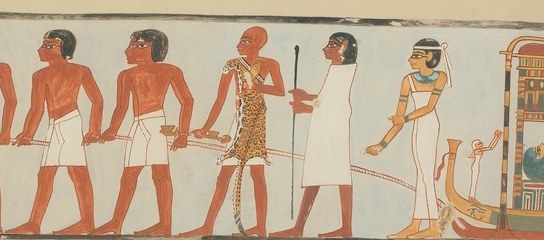 The body travels by sledge, pulled by cattle.