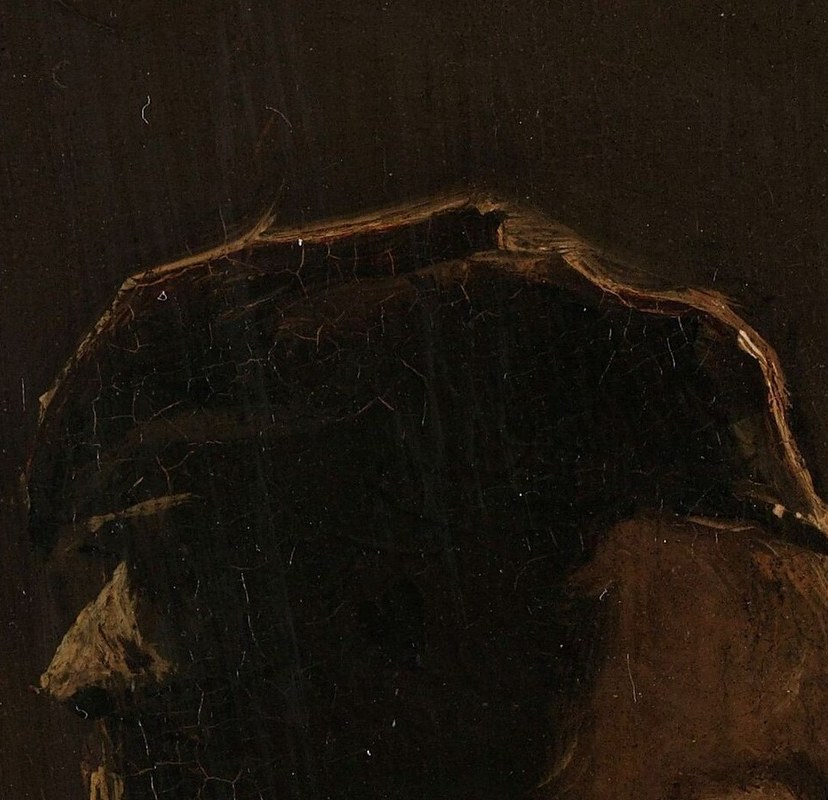 The cap adds to the sitter's artistic persona and frames his face.
