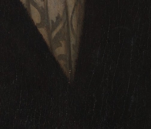 The skin texture looks finely cracked.