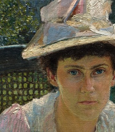 Her gaze is direct, introspective.