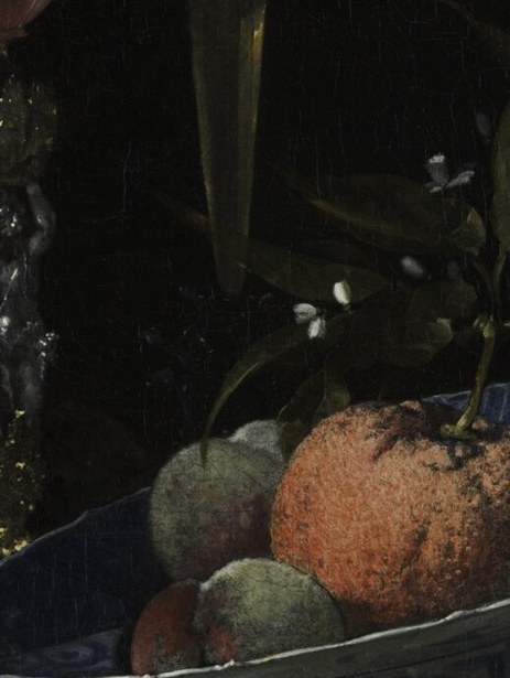 The brightest warm note in the composition; oranges were luxury imports and status symbols in the Dutch Republic, making this a deliberate wealth signal.
