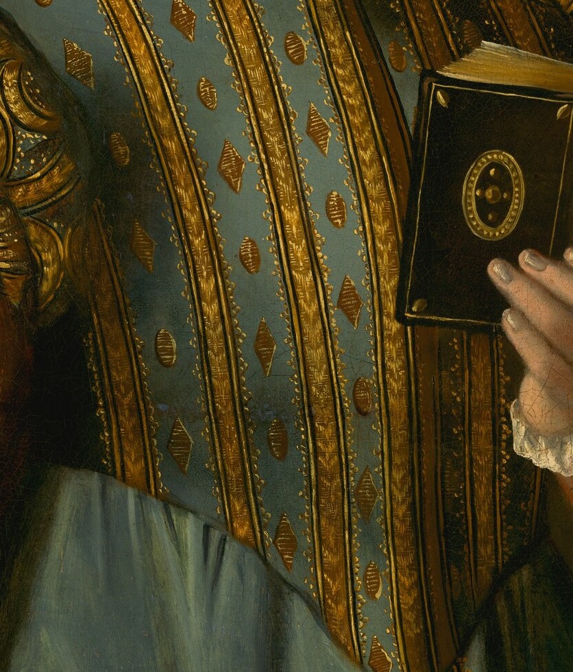 The detailed embroidery and contrasting blue and gold patterns showcase the fashion of the era and the artist's skill.