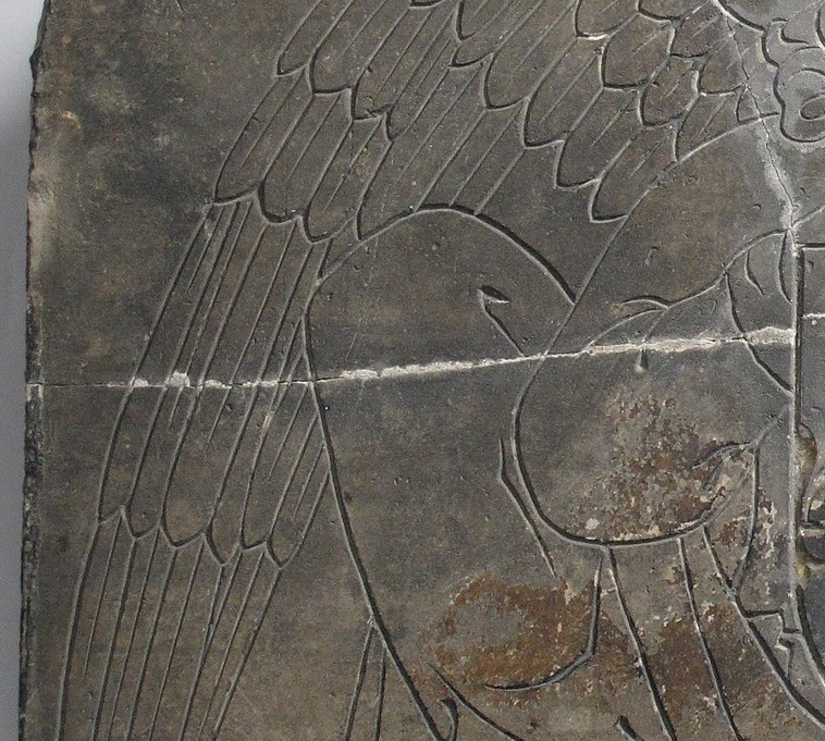 The individual feathers are still visible, even after centuries.