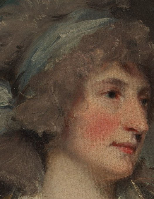 She stares directly at you. Who is she?