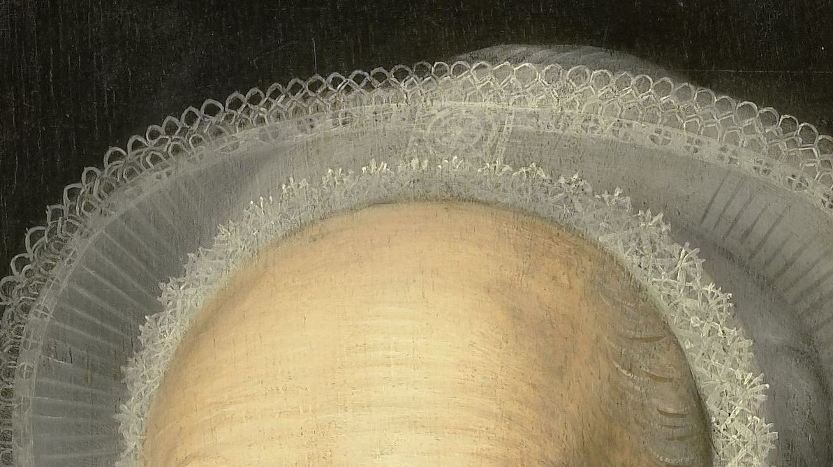 Look at the fine lace of her cap, a sign of her status.