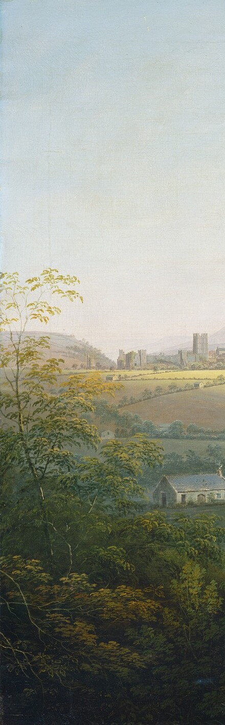 A classic picturesque repoussoir device , the near-black canopy pushes the eye inward and deepens the sense of an enclosed valley theatre around the ruins