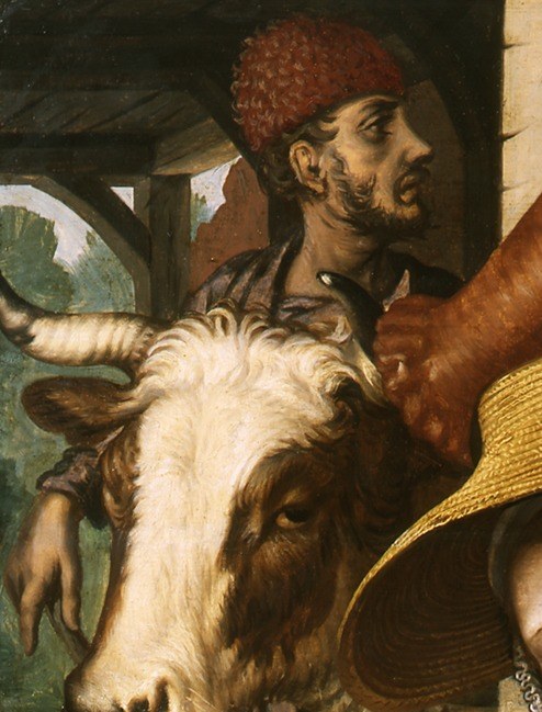 A living animal inserted into a still-life context; the ox's eye and muzzle are startlingly close and alive, collapsing the distance between the viewer and the market.