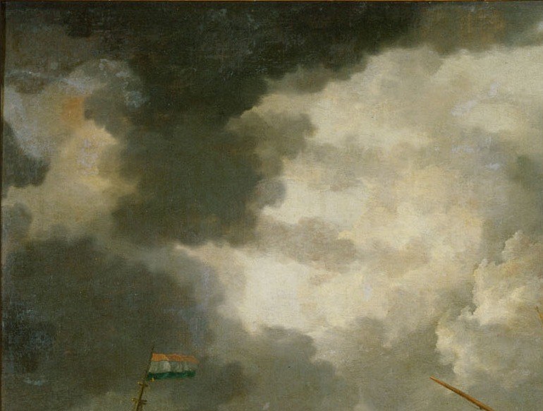 Notice how the light breaks through the dark clouds.