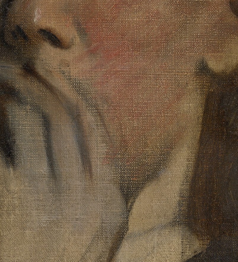 Her hand covers her mouth, holding back a thought or secret.