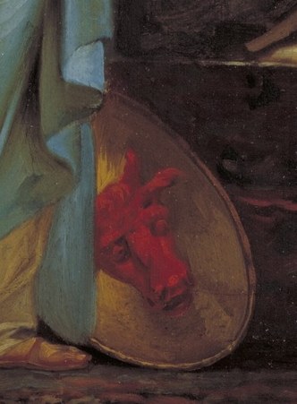 Now, look closely at the other shield, at her feet.