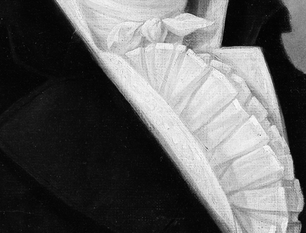 The crisp cravat, perfectly tied, speaks of care.