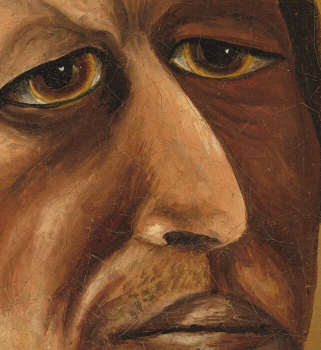 The strong profile emphasizes his facial structure and adds to the portrait's gravitas.