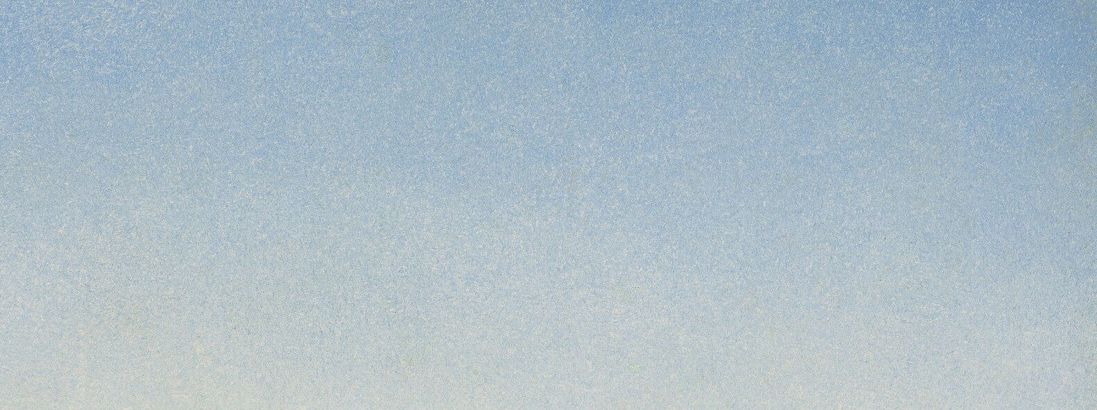 Look closely at the distant mountains on the far shore.