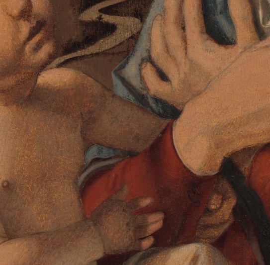 His soft, rounded form and vulnerable pose emphasize his innocence and humanity.